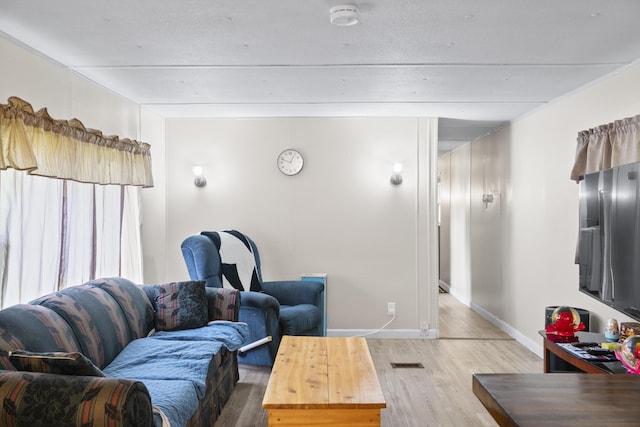 14 Lakeshore Dr, Belgrade, ME 04918 - living room with wood finished floors and baseboards
