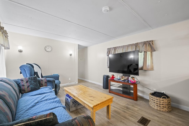 14 Lakeshore Dr, Belgrade, ME 04918 - living area featuring baseboards and wood finished floors