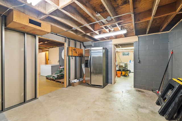 11 Ridgewood Dr, Lebanon, ME 04027 - below grade area featuring stainless steel fridge