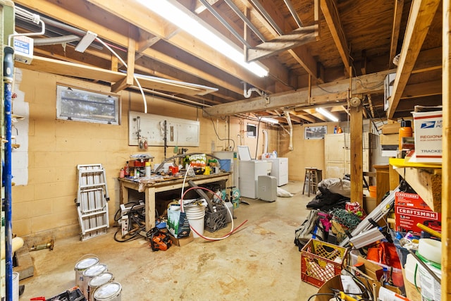 11 Ridgewood Dr, Lebanon, ME 04027 - unfinished basement featuring separate washer and dryer and a workshop area