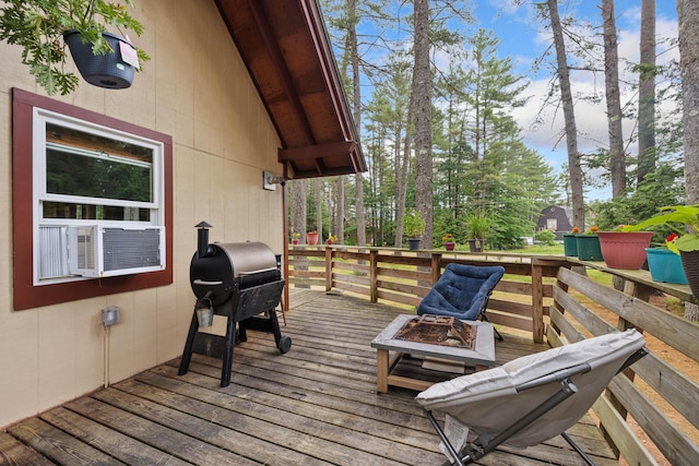 11 Ridgewood Dr, Lebanon, ME 04027 - wooden terrace featuring a grill, a fire pit, and cooling unit