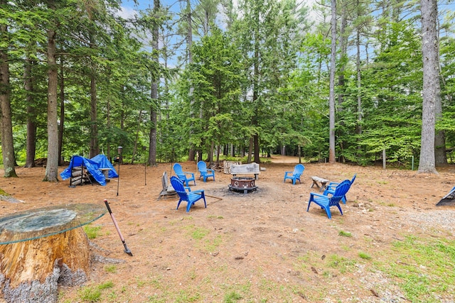 11 Ridgewood Dr, Lebanon, ME 04027 - view of jungle gym featuring an outdoor fire pit