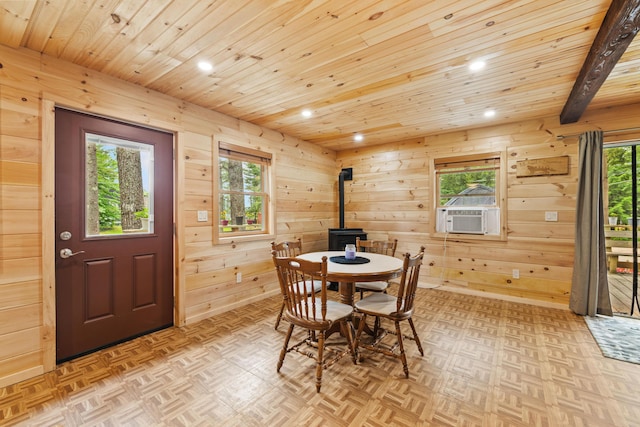 11 Ridgewood Dr, Lebanon, ME 04027 - dining area with a wood stove, wood ceiling, recessed lighting, healthy amount of natural light, and cooling unit