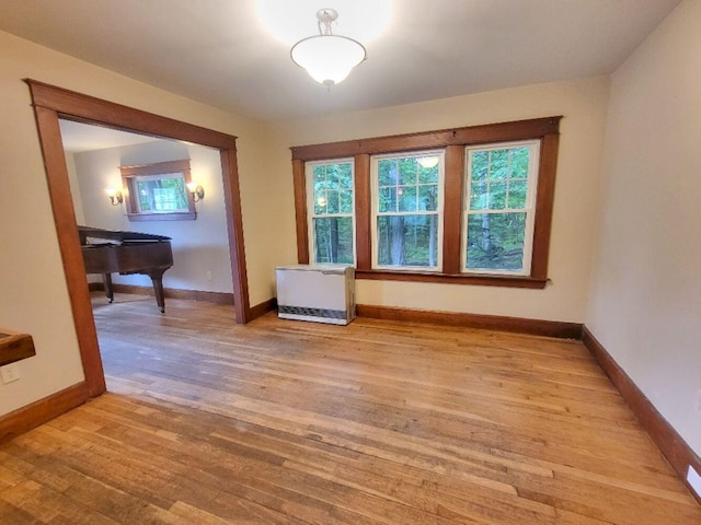 12 Allen St, Wilton, ME 04294 - spare room featuring light wood-style flooring and heating unit