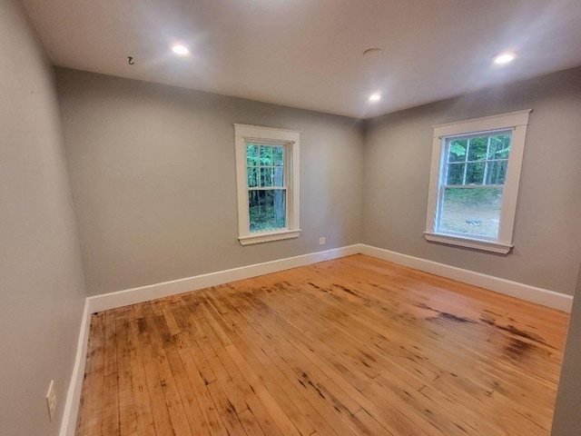 12 Allen St, Wilton, ME 04294 - unfurnished room with healthy amount of natural light, light wood-type flooring, and recessed lighting