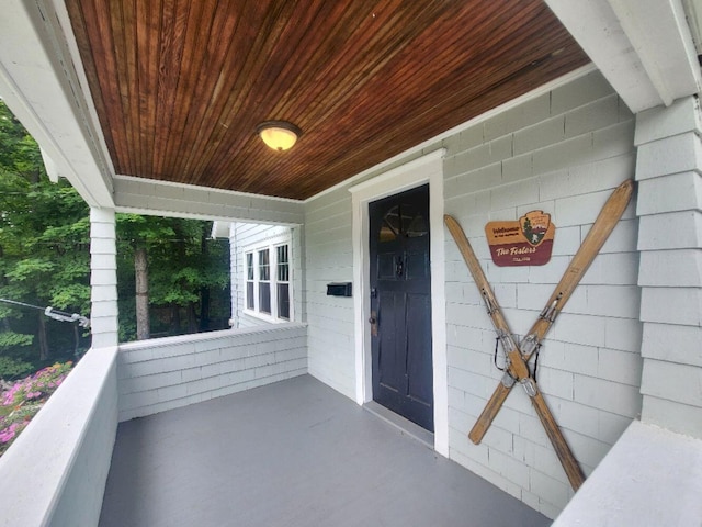 12 Allen St, Wilton, ME 04294 - property entrance featuring a porch