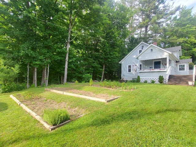 12 Allen St, Wilton, ME 04294 - view of green lawn featuring a porch