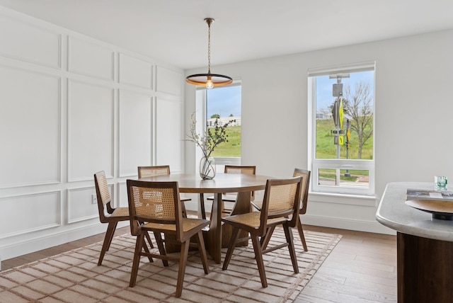 218 Washington Ave Unit 107, Portland, ME 04101 - dining area with light wood finished floors