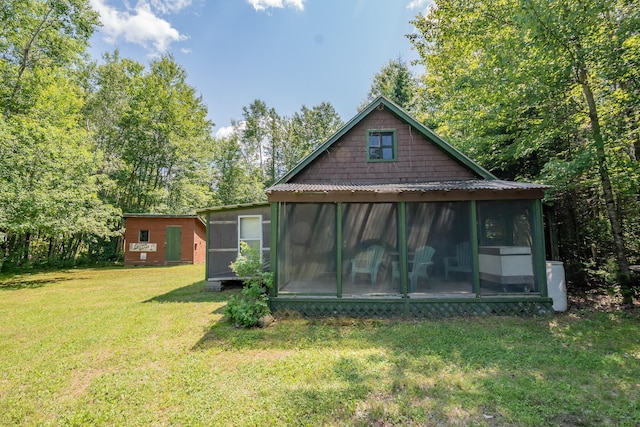 LOT4 Brimstone Rd, Lagrange, ME 04453 - rear view of house featuring a sunroom, a yard, and a metal roof
