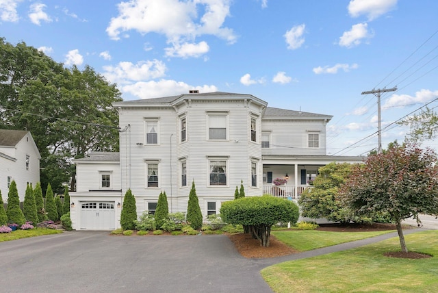 709 High St, Bath, ME 04530 - italianate house featuring a front lawn, driveway, and an attached garage