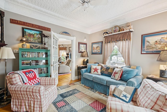 709 High St, Bath, ME 04530 - living area with wood finished floors, ceiling fan, and crown molding