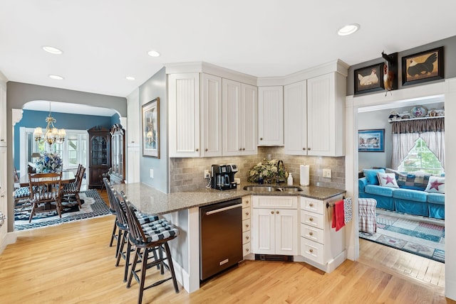 709 High St, Bath, ME 04530 - kitchen featuring dishwasher, a chandelier, plenty of natural light, light wood-type flooring, and recessed lighting