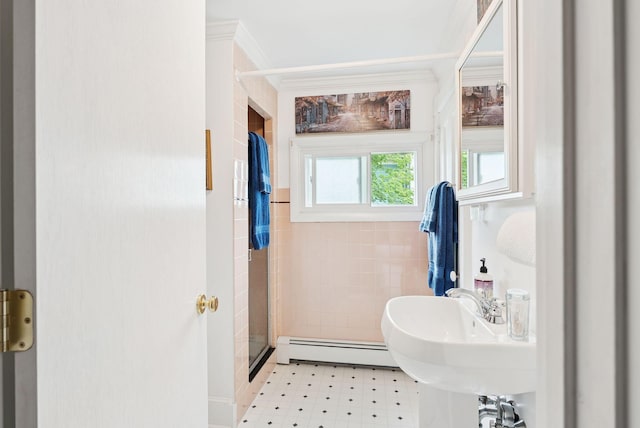 709 High St, Bath, ME 04530 - bathroom with a baseboard heating unit, a stall shower, tile walls, and tile patterned floors