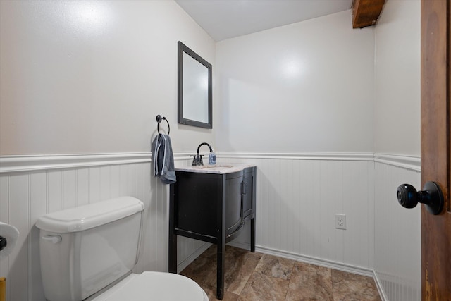 24 Blackswoods Rd, Franklin, ME 04634 - bathroom featuring wainscoting and vanity