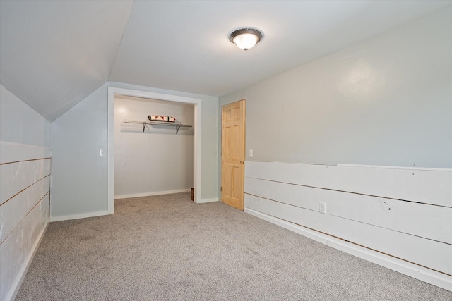 24 Blackswoods Rd, Franklin, ME 04634 - unfurnished bedroom featuring carpet, a closet, and vaulted ceiling