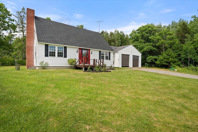 24 Blackswoods Rd, Franklin, ME 04634 - view of front of home with driveway, a chimney, an attached garage, and a front lawn
