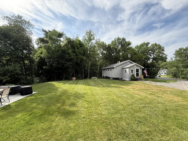 429 Rte 3, Palermo, ME 04354 - view of green lawn with entry steps