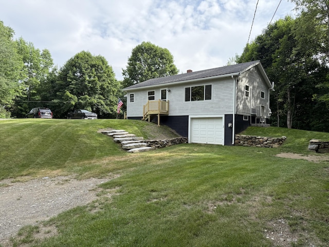 429 Rte 3, Palermo, ME 04354 - back of property featuring an attached garage, driveway, a chimney, and a lawn