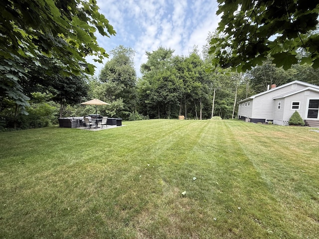 429 Rte 3, Palermo, ME 04354 - view of grassy yard with an outdoor living space and a patio area