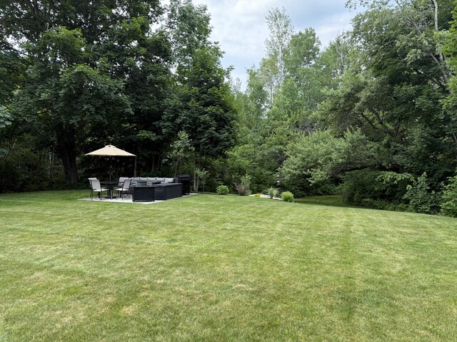 429 Rte 3, Palermo, ME 04354 - view of grassy yard featuring an outdoor living space and a patio