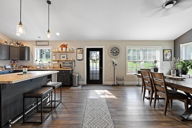 15 Fieldstone Dr, Augusta, ME 04330 - dining room with vaulted ceiling, ceiling fan, and dark wood finished floors