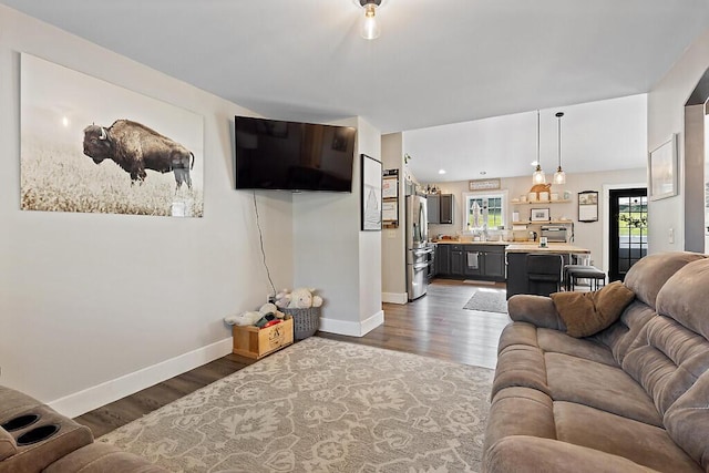 15 Fieldstone Dr, Augusta, ME 04330 - living area featuring baseboards and dark wood-style floors