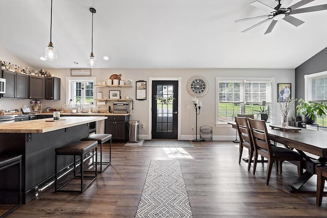 15 Fieldstone Dr, Augusta, ME 04330 - dining room with healthy amount of natural light, vaulted ceiling, a ceiling fan, dark wood-style floors, and recessed lighting