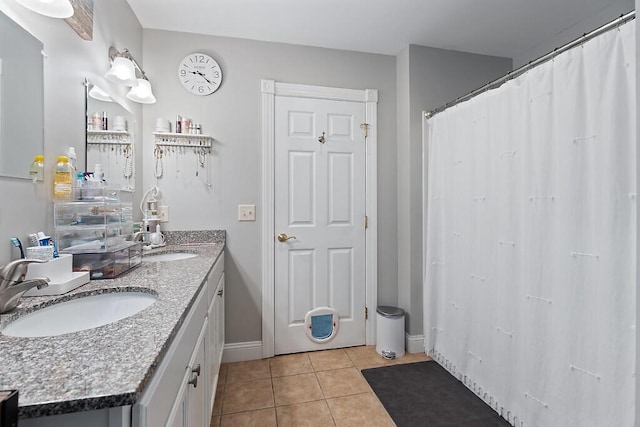 15 Fieldstone Dr, Augusta, ME 04330 - full bath featuring double vanity, tile patterned floors, and a shower with shower curtain
