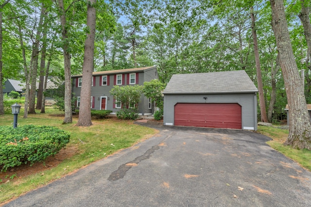 14 Pinewood Cir, Biddeford, ME 04005 - colonial home with an outbuilding, driveway, and an attached garage