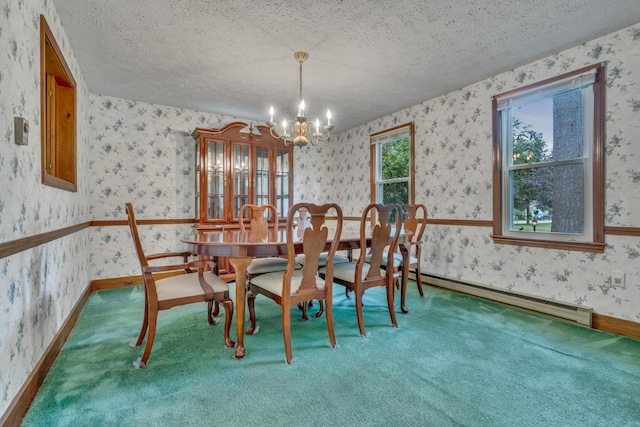 14 Pinewood Cir, Biddeford, ME 04005 - carpeted dining room featuring wallpapered walls, a textured ceiling, a chandelier, and baseboard heating