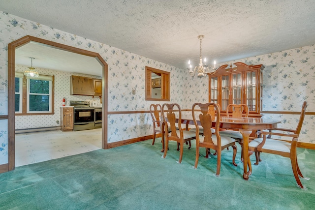 14 Pinewood Cir, Biddeford, ME 04005 - dining space with wallpapered walls, a chandelier, a textured ceiling, a baseboard radiator, and light colored carpet