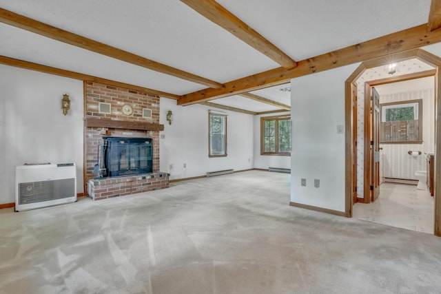 14 Pinewood Cir, Biddeford, ME 04005 - unfurnished living room with carpet floors, beam ceiling, a fireplace, a baseboard heating unit, and heating unit