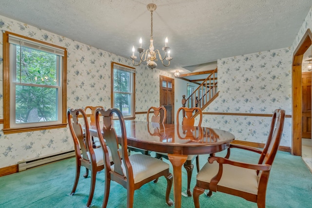 14 Pinewood Cir, Biddeford, ME 04005 - dining area featuring wallpapered walls, a chandelier, a textured ceiling, carpet flooring, and stairs