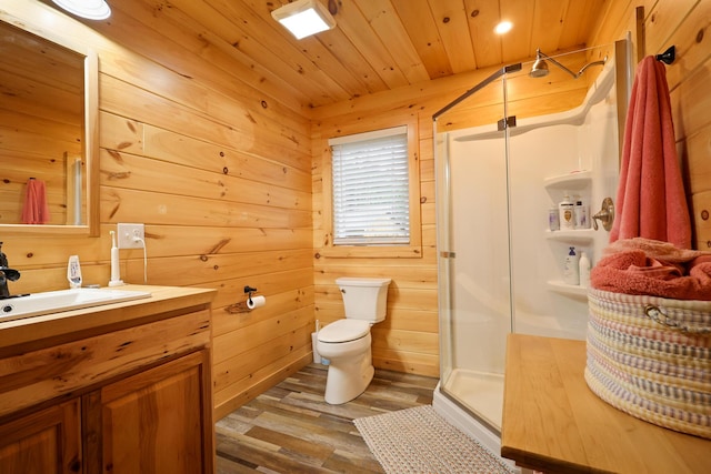 92 Cottage Shore Dr, Holden, ME 04429 - bathroom with vanity, wood finished floors, a stall shower, wooden ceiling, and wood walls