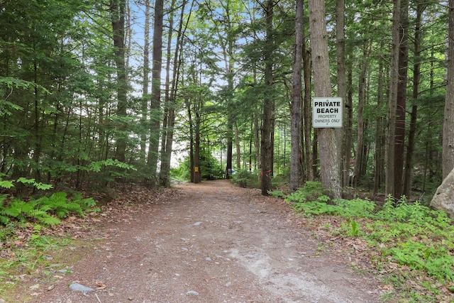 92 Cottage Shore Dr, Holden, ME 04429 - view of street featuring a wooded view