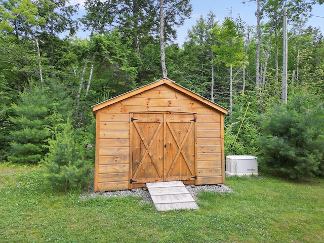92 Cottage Shore Dr, Holden, ME 04429 - view of shed with a wooded view