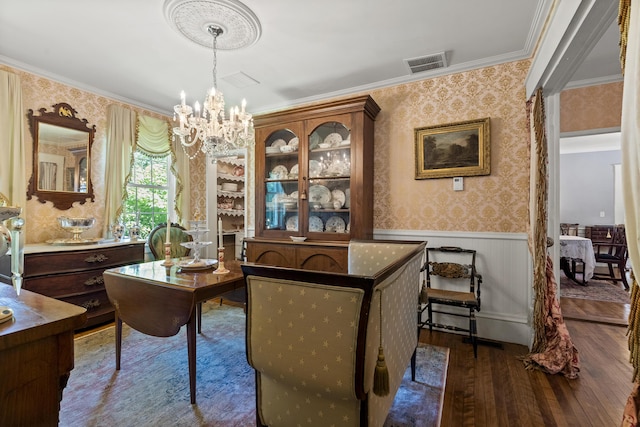 18 High St, Wiscasset, ME 04578 - office featuring wallpapered walls, dark wood finished floors, a chandelier, wainscoting, and crown molding