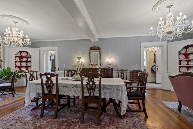 18 High St, Wiscasset, ME 04578 - dining room featuring a chandelier, built in features, ornamental molding, wood finished floors, and beam ceiling
