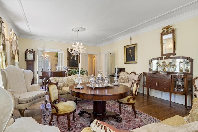 18 High St, Wiscasset, ME 04578 - dining space with a chandelier, wood finished floors, and crown molding