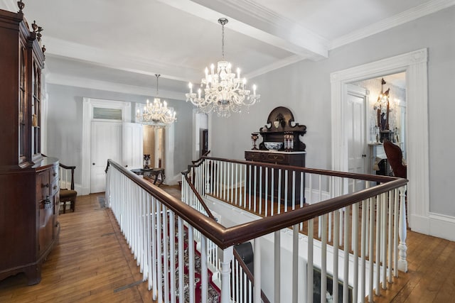 18 High St, Wiscasset, ME 04578 - corridor with a chandelier, an upstairs landing, wood-type flooring, beam ceiling, and crown molding