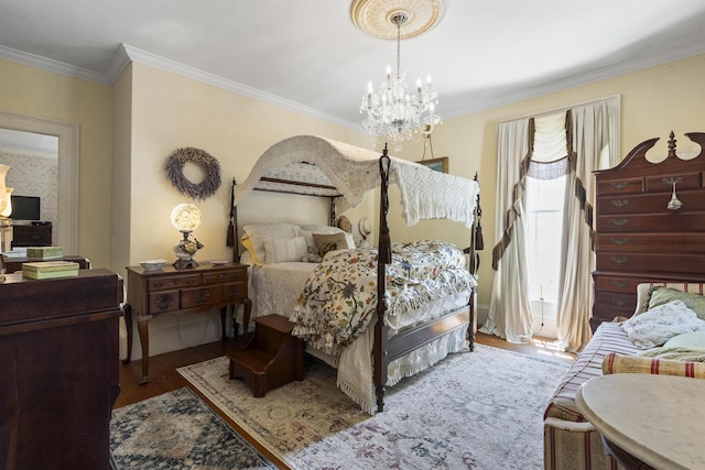 18 High St, Wiscasset, ME 04578 - bedroom featuring a chandelier, wood finished floors, and crown molding