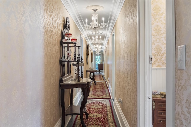 18 High St, Wiscasset, ME 04578 - corridor featuring a chandelier, wallpapered walls, and ornamental molding