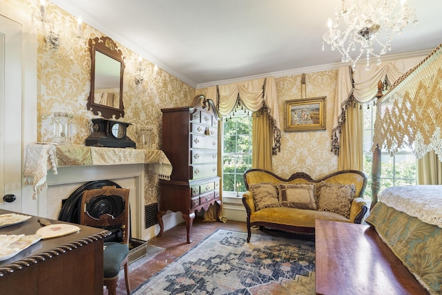 18 High St, Wiscasset, ME 04578 - bedroom with wallpapered walls, ornamental molding, a chandelier, and a fireplace