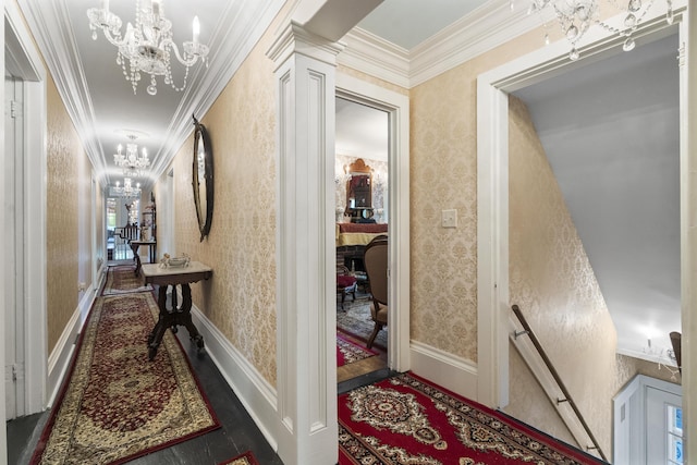 18 High St, Wiscasset, ME 04578 - corridor with a chandelier, wallpapered walls, and crown molding