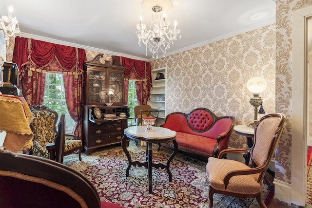 18 High St, Wiscasset, ME 04578 - living area featuring wallpapered walls, a chandelier, and ornamental molding