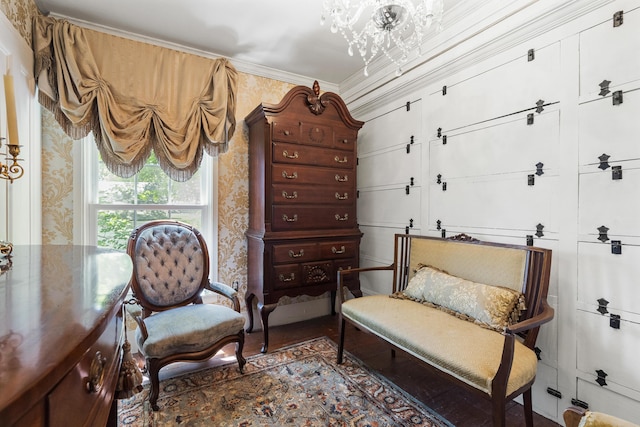 18 High St, Wiscasset, ME 04578 - living area with ornamental molding, a chandelier, and wallpapered walls
