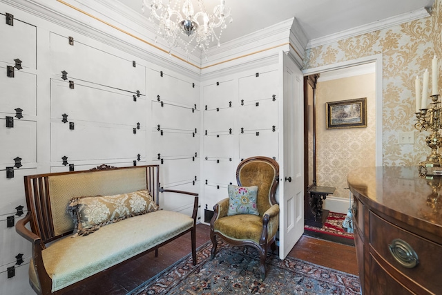 18 High St, Wiscasset, ME 04578 - sitting room with wallpapered walls, wood finished floors, ornamental molding, and a chandelier
