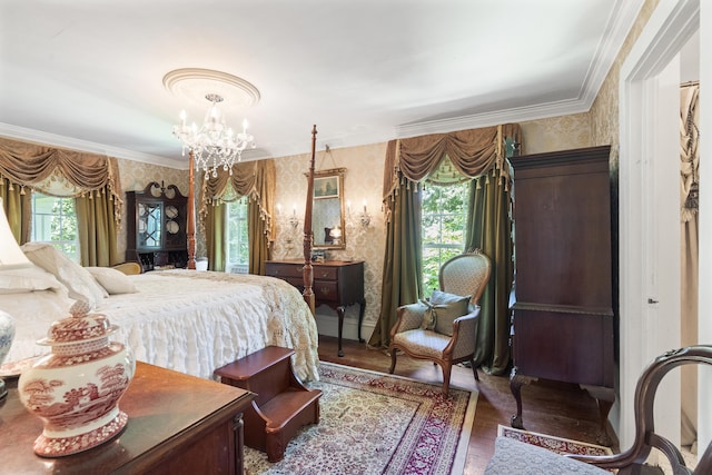 18 High St, Wiscasset, ME 04578 - bedroom with wallpapered walls, wood finished floors, a chandelier, and ornamental molding