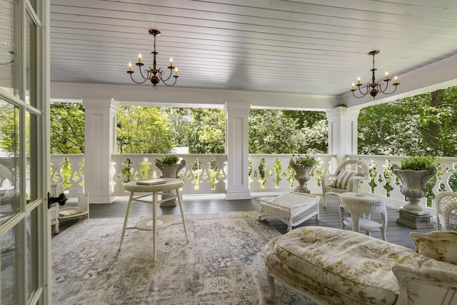 18 High St, Wiscasset, ME 04578 - sunroom / solarium featuring a chandelier and healthy amount of natural light