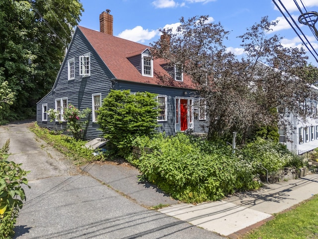 141 Centre St, Bath, ME 04530 - view of front of property with a chimney and roof with shingles